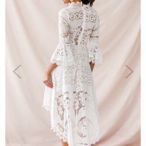 White high-low bell-sleeve dress